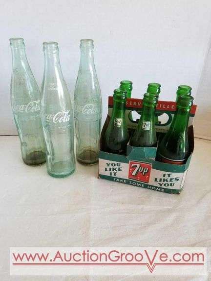 16 And 32 Oz Coke Bottles With Caps Swico Auctions