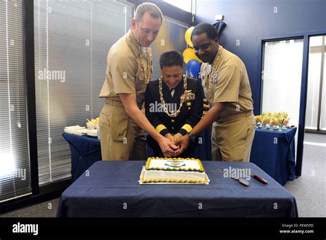 160201 N Zb122 003 Hagatna Guam Feb 1 2016 Cmdr Michael Lee Navy Recruiting District Nrd Los Angeles Commanding Officer Recites The Oath Of Enlistment With Two Recruits During The Opening Ceremony Of Navy Recruiting