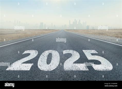 2020 2025 Written On Highway Road In The Middle Of Empty Asphalt Road
