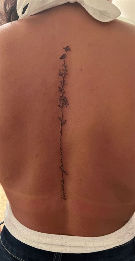 30 Beautiful Flower Tattoo Ideas Meaningful Flower Spine Tattoo I