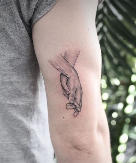 30 Great Holding Hands Tattoos You Will Love Hand Tattoos Tattoos