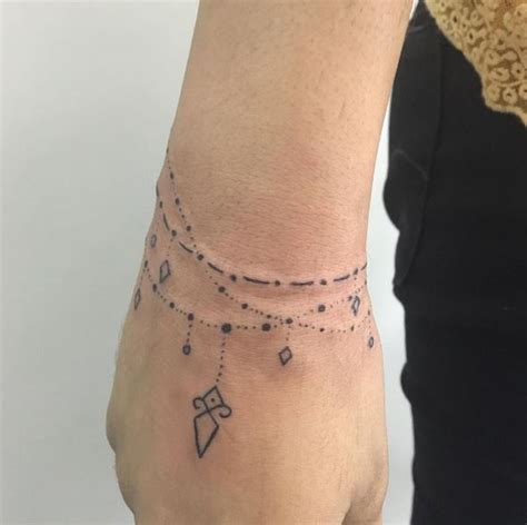 50 Charming Wrist Bracelet Tattoos Designs And Ideas 2018