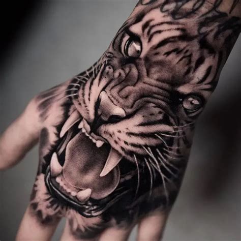 7 Best Tiger Hand Tattoo Ideas Tiger Hand Tattoo Tiger Tattoo Design Tiger Tattoo 7 Best Tiger Hand Tattoo Ideas Tiger Hand Tattoo Tiger Tattoo Design Tiger Tattoo