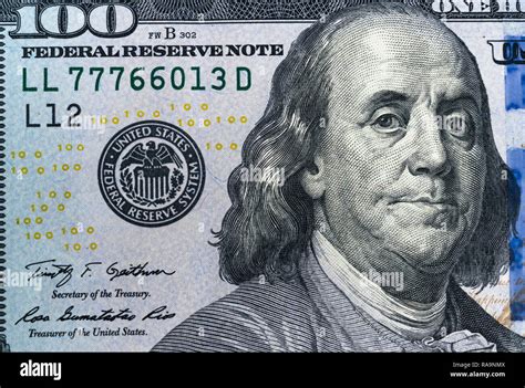 A 100 Bill With Focus On Benjamin Franklin Us Banknotes Close Up A 100 Bill With Focus On Benjamin Franklin Us Banknotes Close Up