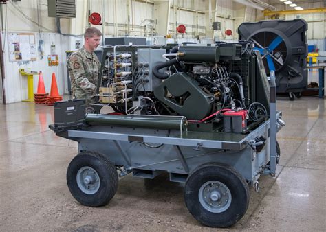 Aerospace Ground Equipment Age Personnel Secure Safety Restraints On Ground Support Equipment At Creech Air Force Base Nevada Before Shipping To Deployed Locations To Support Remotely Piloted Aircraft Operations The Age Shop