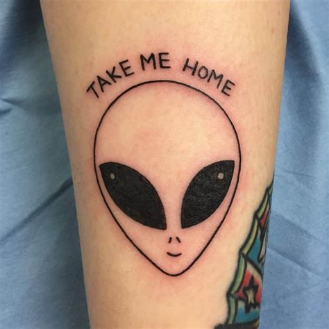 Alien Face Tattoo Design