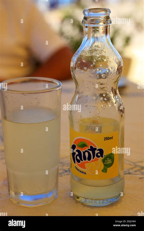 Bottle And Glass Of Fanta Lemon On A Table In A Cafe In Greece Stock Bottle And Glass Of Fanta Lemon On A Table In A Cafe In Greece Stock