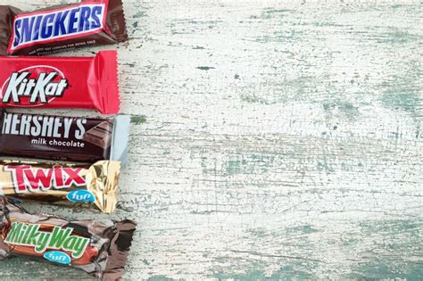 Chocolate Bars Mix Packages On An Old Wooden Background Kit Kat Chocolate Bars Mix Packages On An Old Wooden Background Kit Kat