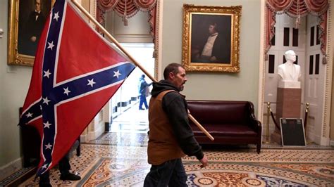 Confederate Flag During Civil War Never Made It Inside Us Capitol But A Rioter Carried One Inside January 6 Cnn