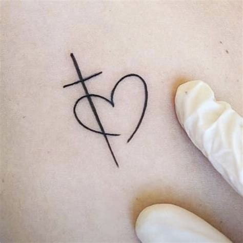 Cross And Heart Tattoo On Finger