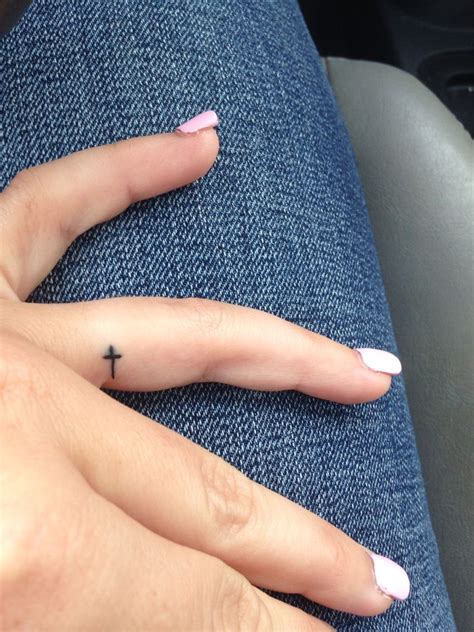 Cross Tattoo On Ring Finger Watercolor Tattoo Design Cross Tattoo On Ring Finger Watercolor Tattoo Design
