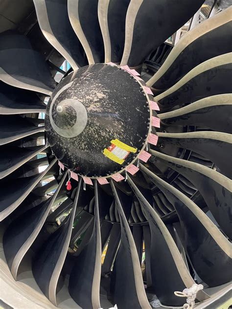 Detailed View Of High Bypass Turbofan Jet Engine Under Repair Stock
