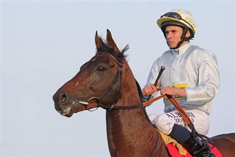 Download Award Winning Golfer Ryan Moore Posing On The Green Wallpaper