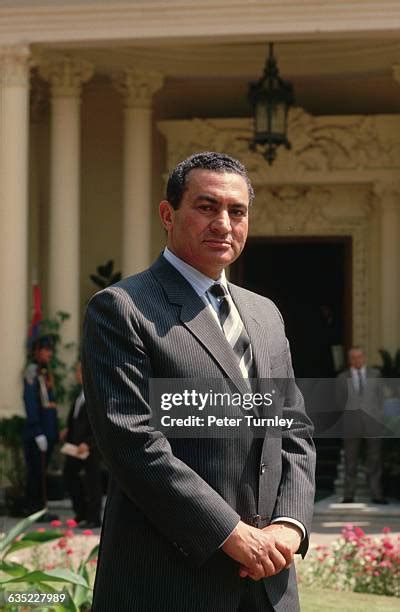 Egypt S Hosni Mubarak Waves Grins As His Retrial Starts The Denver Post
