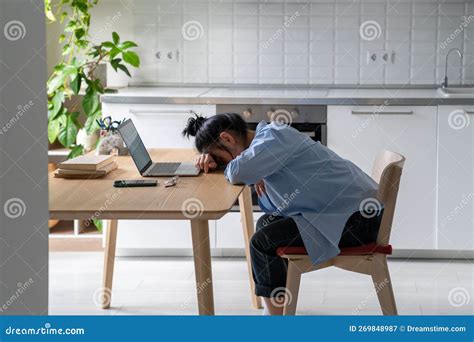 Exhausted Asian Freelancer Woman Overworked Tired From Work Or Study On