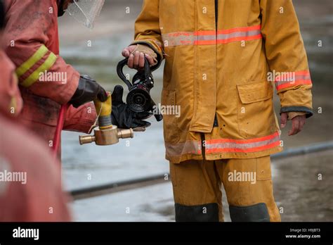 Fireman Carry Hi Res Stock Photography And Images Alamy