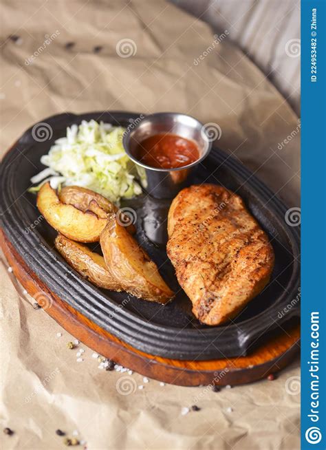 Grilled Chicken Filet Steak With Fried Rustic Potatoes Green Salad And