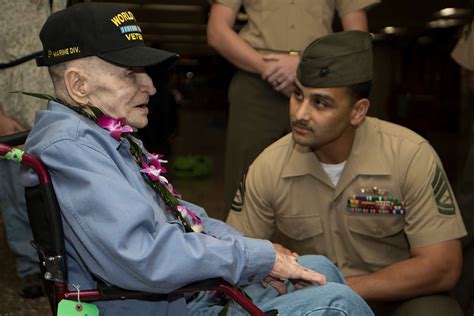 Gunnery Sgt Jose A Ortega Special Operations Command Pacific Paraloft Chief Listens To Pfc Jimmy Keep A World War Ii Marine Reminisce About His Time During The War Keep Made A Stop