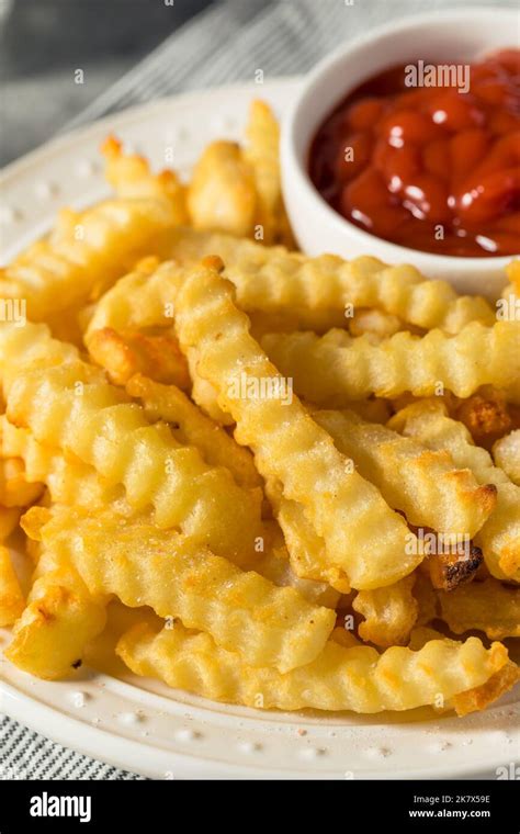 Homemade Crinkle Cut French Fries With Ketchup Stock Photo Alamy Homemade Crinkle Cut French Fries With Ketchup Stock Photo Alamy