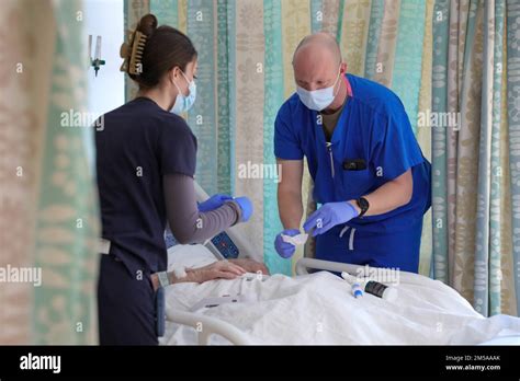 Lawrence Mass U S Air Force Capt Michael Grady Right A Registered Nurse Assigned To The U S Air Force Military Medical Team Deployed To Lawrence Massachusetts And Jessica Licata Left A Registered