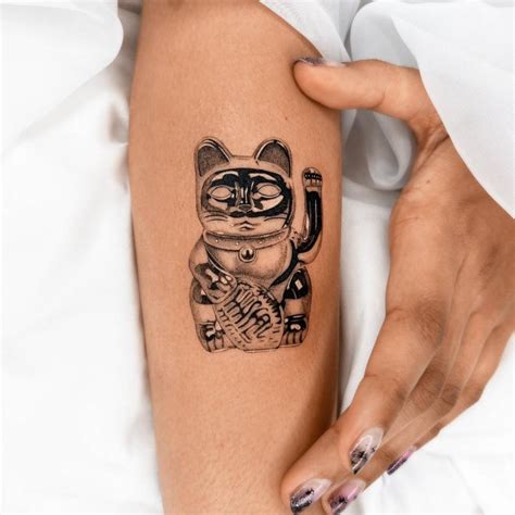 Maneki Neko Wrist Tattoo