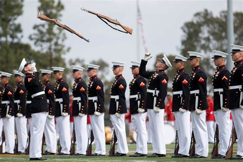 Marine Corps Silent Drill Team Soldiers Spinning Their Rifles