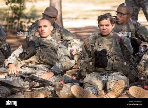 Men And Women Soldiers At Basic Combat Training Rest During Boot Camp