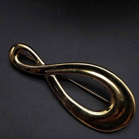 Monet Infinity Symbol Gold Tone Brooch Vintage Costum Gem