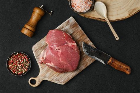 Overhead View Of Raw Beef Ball Tip Steak With Ingredients On Black Background Stock Photo Image Of Meaty Healthy 237980762