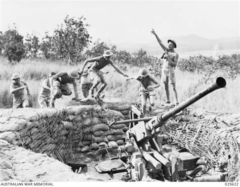Port Moresby Papua 1942 07 An A I F Anti Aircraft Gun Crew Leap To Positions In New Guinea As Australian War Memorial