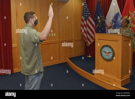 Recruit Mohammad Zaki Ahmadi Swears Into The Indiana National Guard As