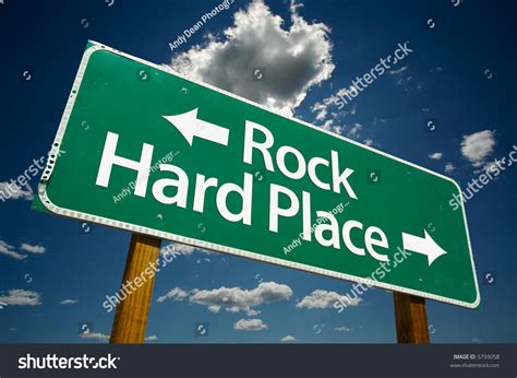 Rock Hard Place Road Sign With Dramatic Clouds And Sky Stock Photo Adobe Stock