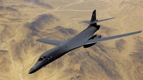Rockwell B 1 Lancer Military Bomber Hd Wallpaper Over Desert Terrain