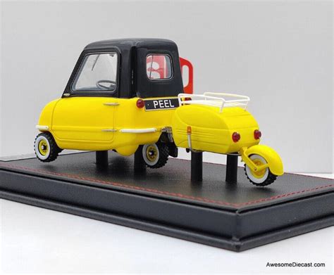 S U M 1 18 1964 Peel P50 Micro Car W Trailer Yellow S U M 1 18 1964 Peel P50 Micro Car W Trailer Yellow
