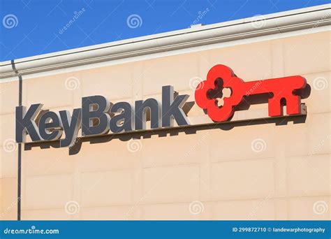 Sign With Brand Logo Of Keybank Banking Location On Building Wall
