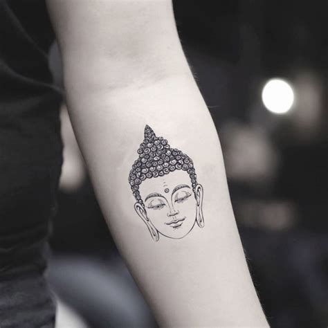 Small Buddhist Symbol Tattoos