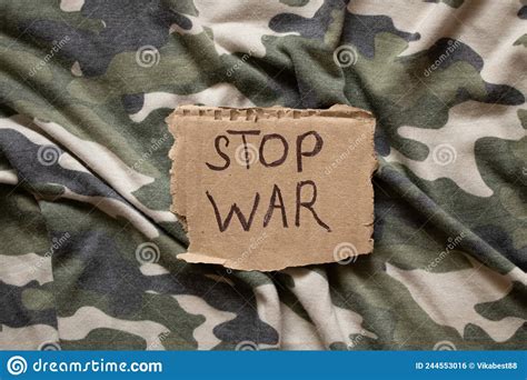 Stop War Is Written On Paper Which Lies On The Soldier Amp 39 S Camouflage
