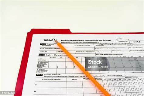 Tax Form 1095C Tax Form Details With Light Background Stock Photo