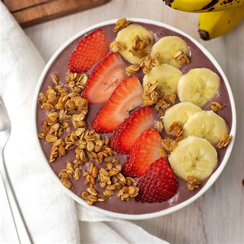 The Saint George A A Bowl Organic Acai Strawberries Blueberries Banana Coconut Water Topped With Granola Strawberries Blueberries Sliced Almonds Chia Seeds Drizzled With Honey Treatyoself Coffee