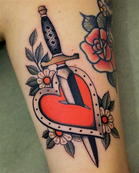 Traditional Heart And Dagger Tattoo Design