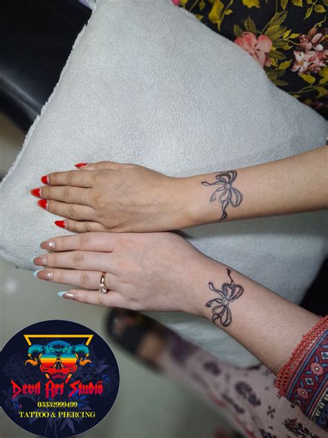 Two Sisters From Lahore Get Matching Bow Tattoos Permanent Tattoo