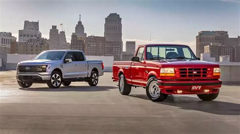 Two Strikes 90S Ford F 150 Lightning Meets Its Shocking Ev Successor Two Strikes 90S Ford F 150 Lightning Meets Its Shocking Ev Successor