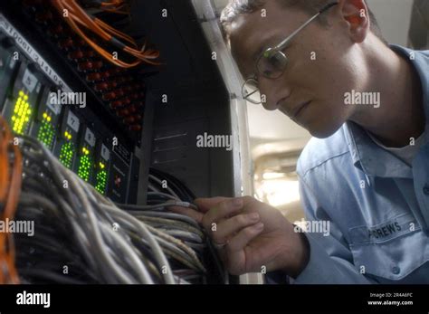 Us Navy Information Systems Technician 1St Class Checks Connections On Us Navy Information Systems Technician 1St Class Checks Connections On