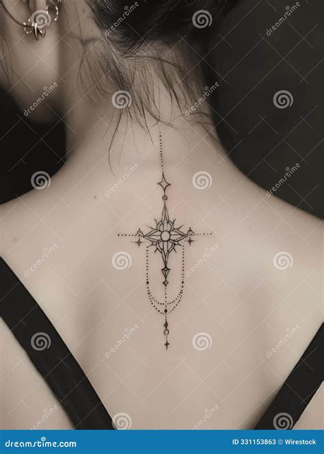 Woman S Back With An Intricate Geometric Tattoo Design On Her Upper