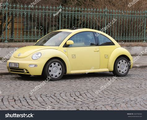 Discover the Charm of a Yellow Volkswagen Beetle: A Classic Car Icon